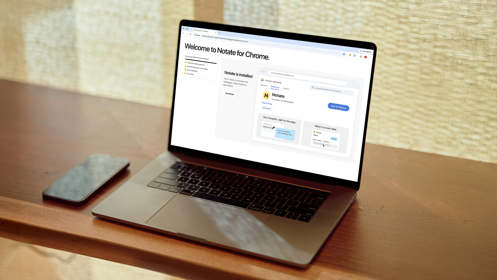 A laptop on a desk showing the Notate welcome page in Chrome