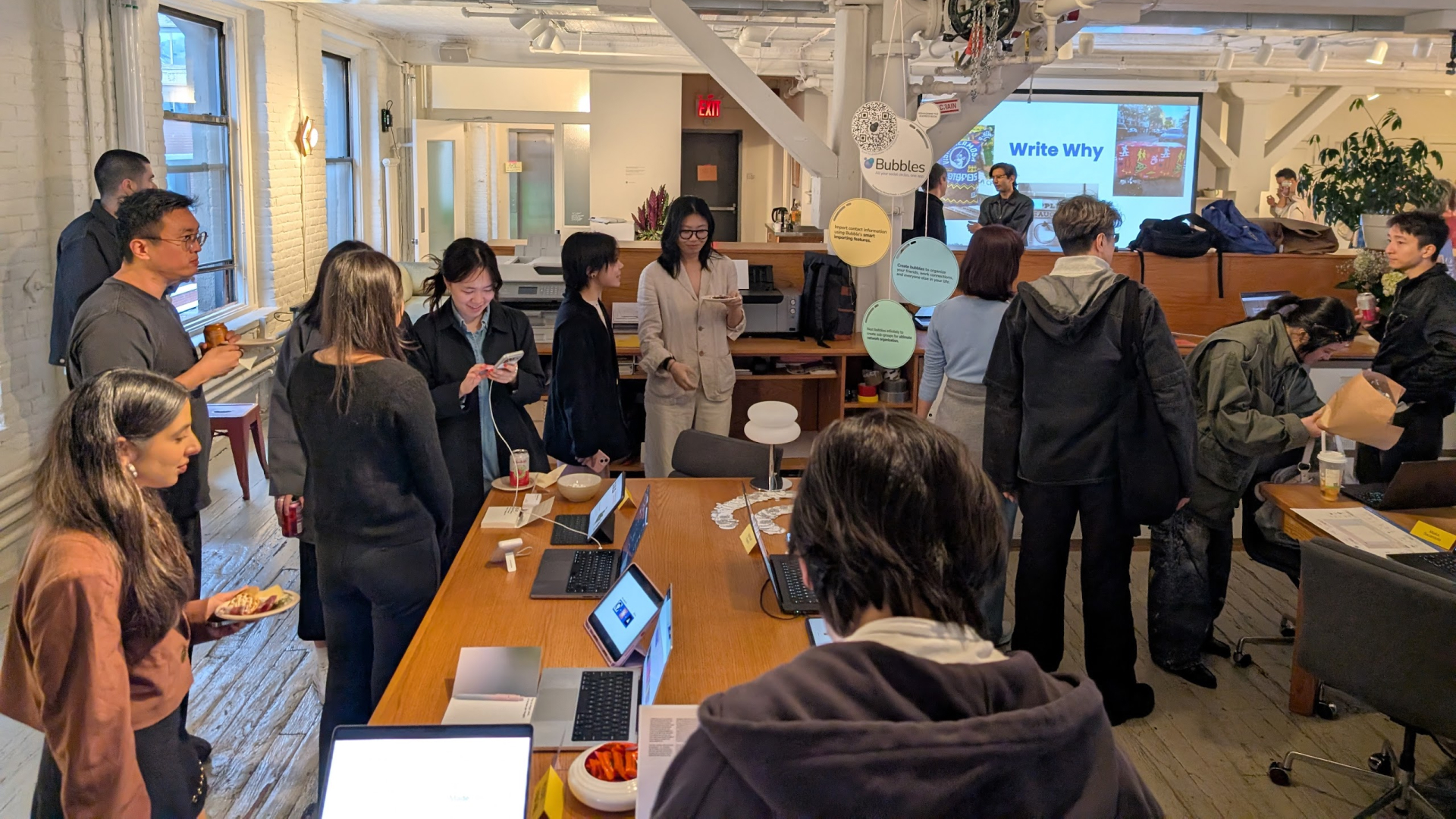 Demo Day at Index Space: people trying yap at the tables